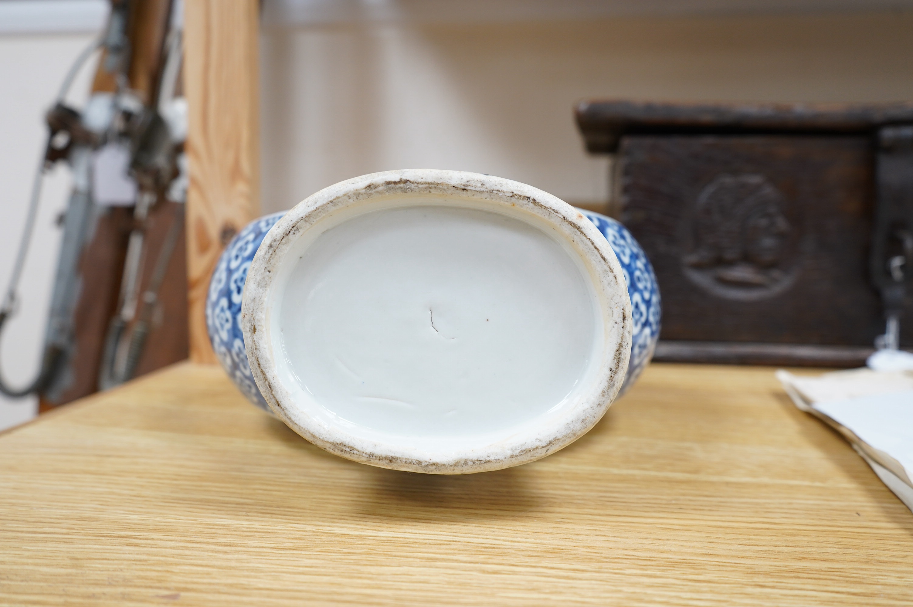 A Chinese blue and white moon flask, 36.5cm high. Condition fair, chips and hairline crack to the rim